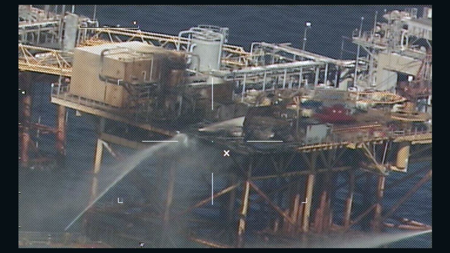 Commercial vessels extinguish a fire on board an oil platform approximately 20 miles off the coast of Grand Isle, Louisiana.