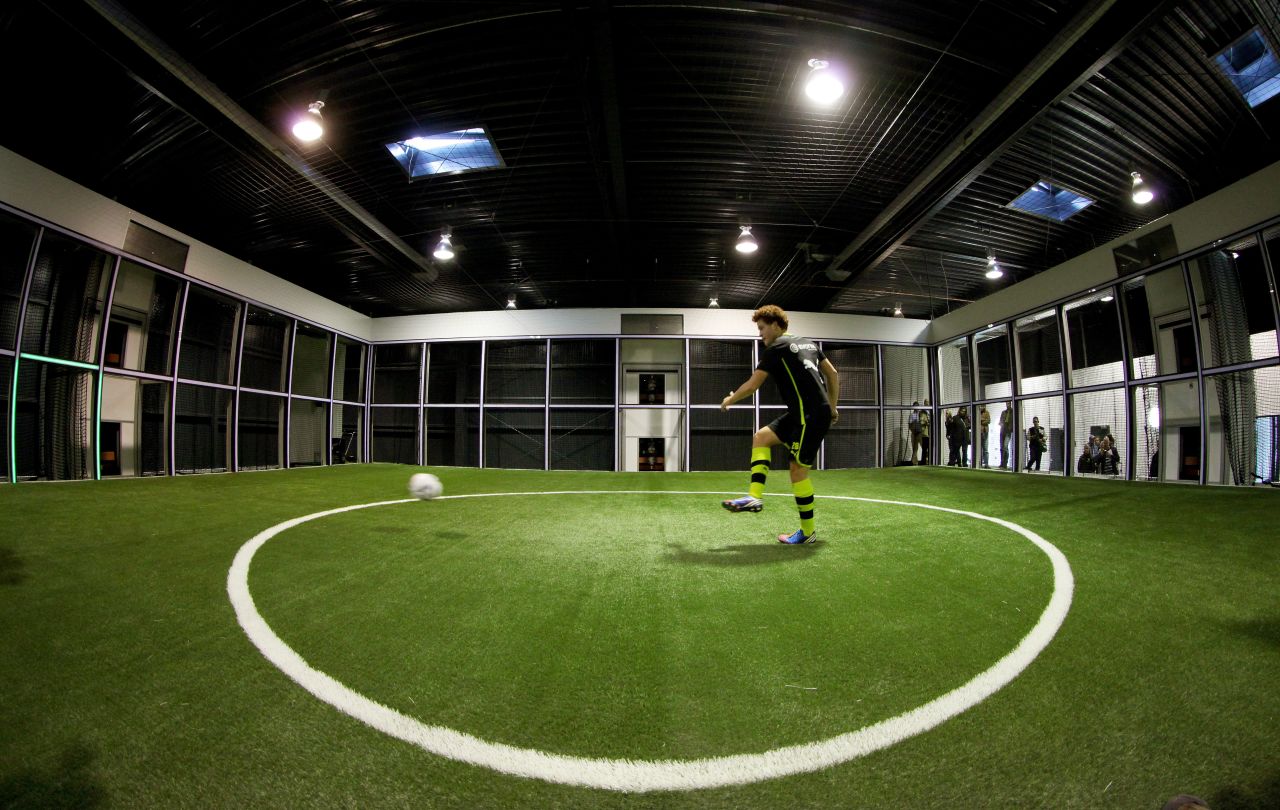 The "Footbonaut" -- is a robotic cage which footballers can use to improve passing, spatial awareness and control. The machine is being used by German champions Borussia Dortmund.