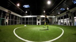 The "Footbonaut" -- is a robotic cage which footballers can use to improve passing, spatial awareness and control. The machine is being used by German champions Borussia Dortmund.