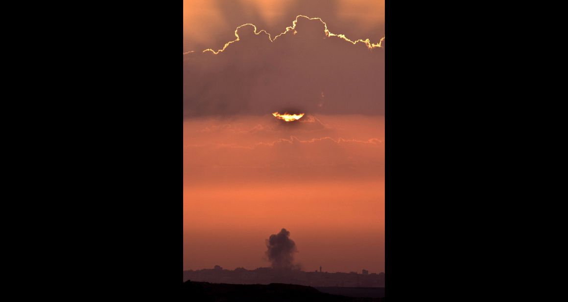 A picture taken from the southern Israeli border with Gaza shows smoke billowing following an Israeli air strike inside the Palestinian territory on Saturday, November 17. Turkish Prime Minister Recep Tayyip Erdogan said that Israel would be held to account for the children who were among 40 people dead in three days of airstrikes on Gaza.