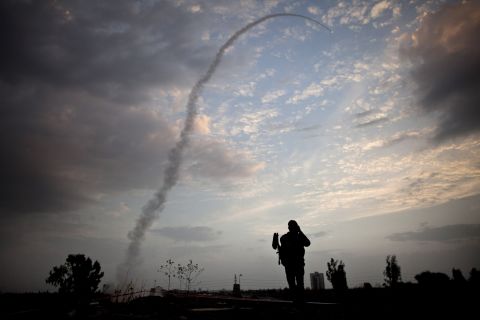 An Israeli missile from the Iron Dome defense missile system is launched to intercept and destroy incoming rocket fire from Gaza on November 17 in Tel Aviv, Israel. Israeli troops have been massing on the border as some 200 targets were hit overnight in Gaza, including Hamas cabinet buildings.