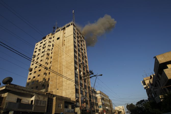 Smoke rises after an Israeli air strike on an office of Hamas television channel Al-Aqsa in the southern Gaza town of Rafah on Sunday, November 18. Israeli warplanes hit the Gaza City media center and homes in northern Gaza in the early morning.