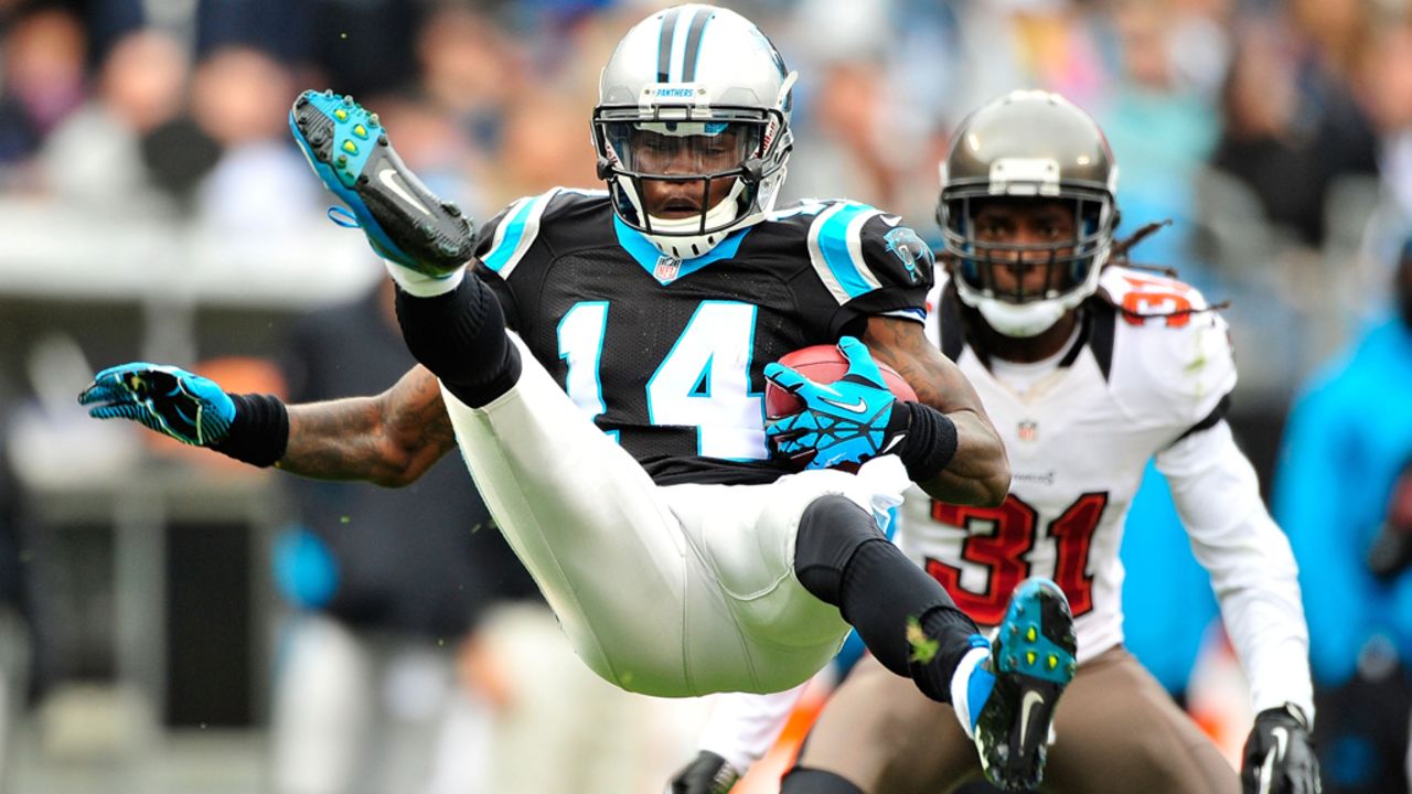 Armanti Edwards of the Panthers is upended by Arrelious Benn of the Buccaneers on a kickoff return on Sunday.