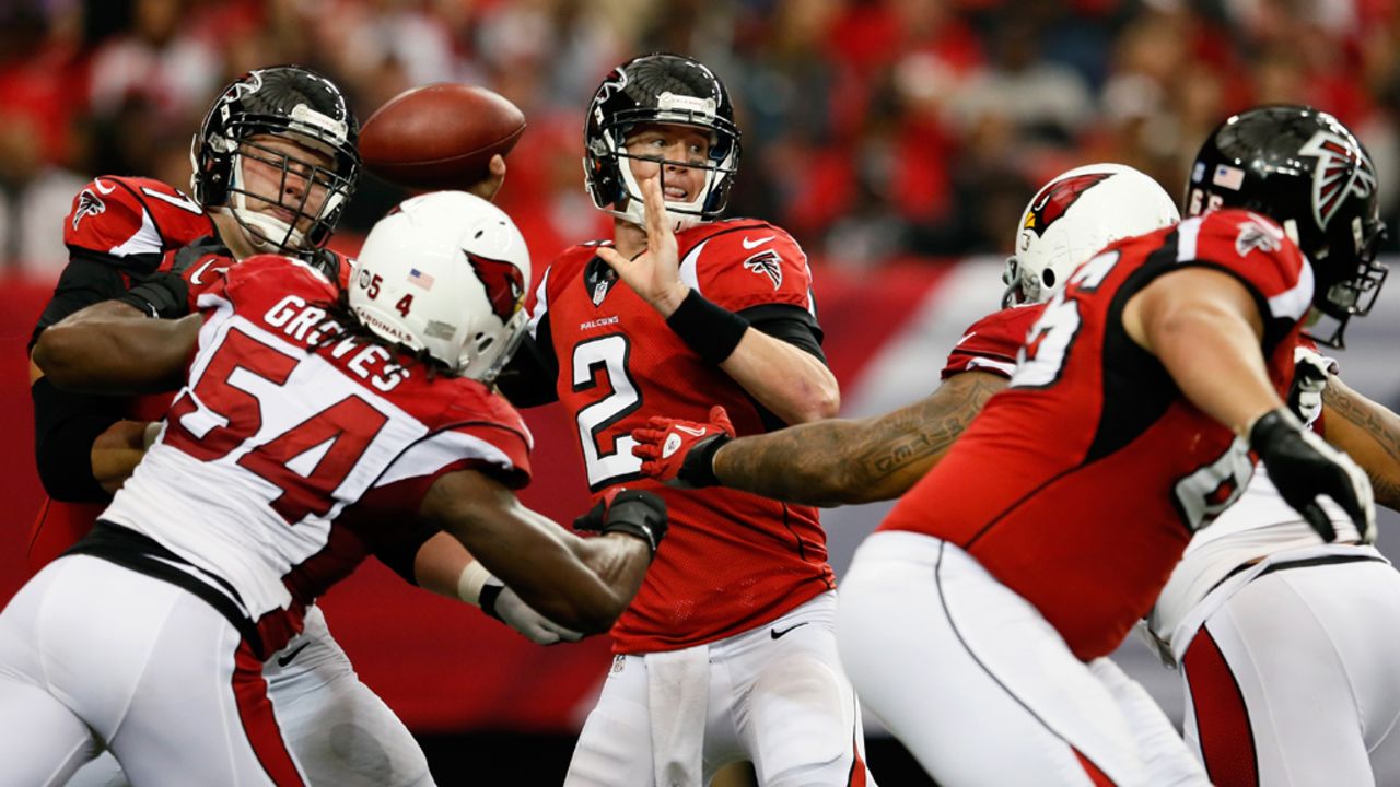 Matt Ryan of the Falcons looks to pass against the Cardinals on Sunday.