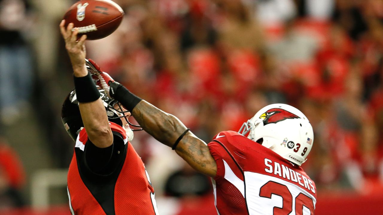 James Sanders of the Cardinals pressures Matt Ryan of the Falcons on Sunday.