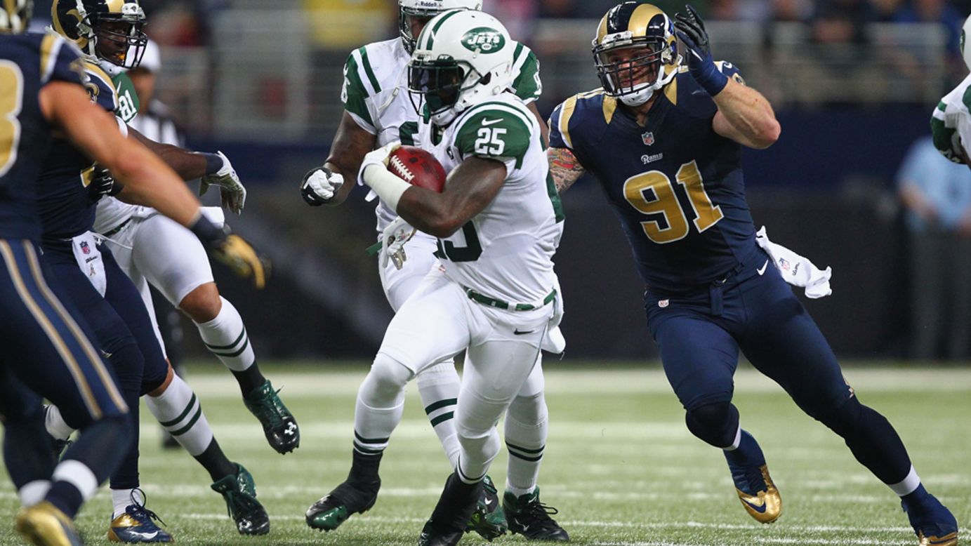Chris Long of the Rams looks to tackle Joe McKnight of the Jets on Sunday.