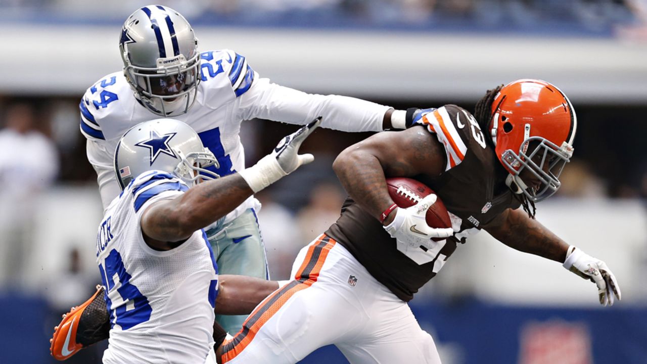 Trent Richardson of the Browns is tackled during a game against the Cowboys on Sunday.