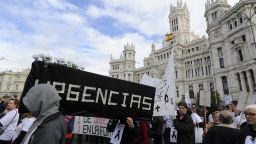 Medical workers demonstrate in Madrid against the Spanish government's latest austerity measures to deal with Spain's crippling debt.