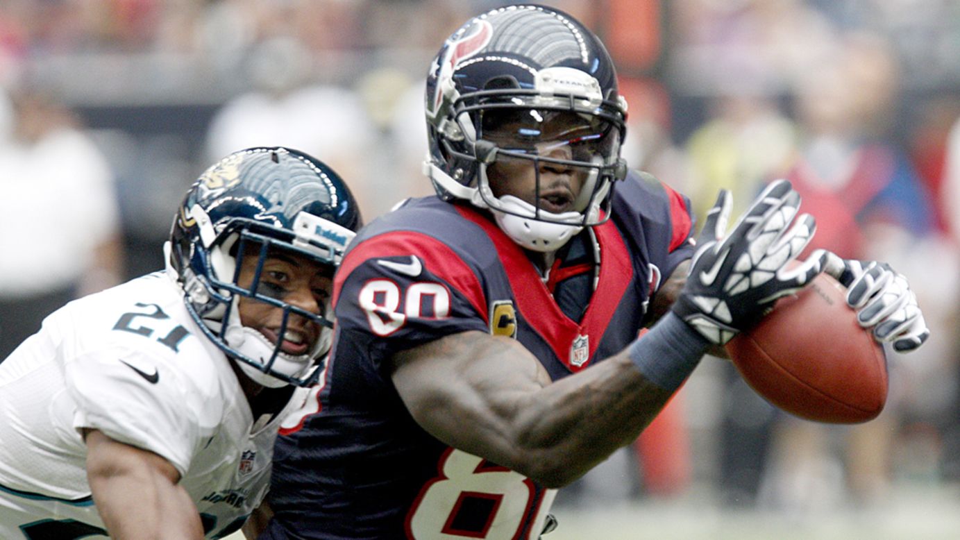 Andre Johnson of the Houston Texans can't quite make the catch while Derek Cox of the Jacksonville Jaguars defends on Sunday at Reliant Stadium in Houston. 