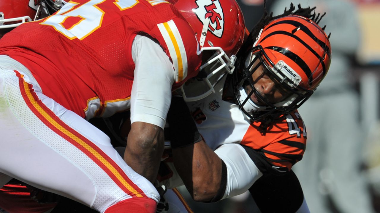 Running back BenJarvus Green-Ellis of the Bengals is tackled by linebacker Derrick Johnson of the Chiefs during the first half on Sunday.