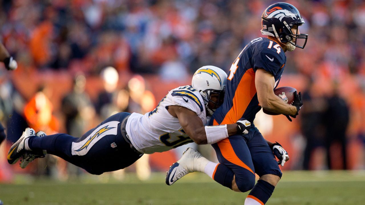 Cornerback Marcus Gilchrist of the Chargers makes a diving tackle after a reception by wide receiver Brandon Stokley of the Broncos on Sunday.