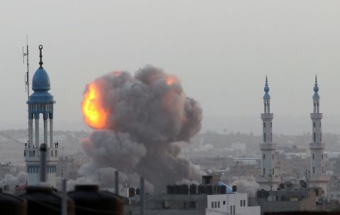 A fireball rises as the Israeli air force carries out a raid over Gaza City on Saturday, November 17.