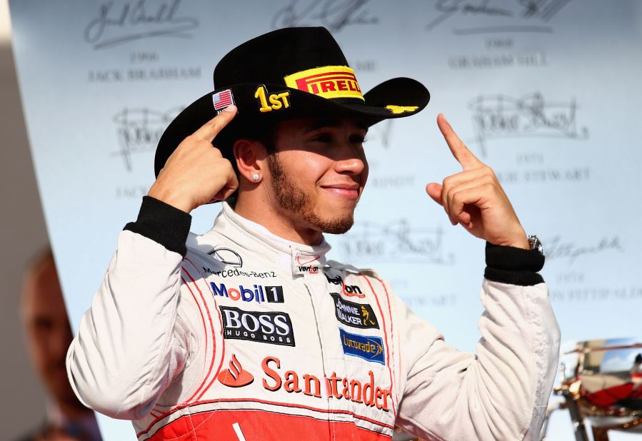 McLaren's Lewis Hamilton revels in winning the inaugural grand prix at the Circuit of the Americas in Austin, Texas, on Sunday.