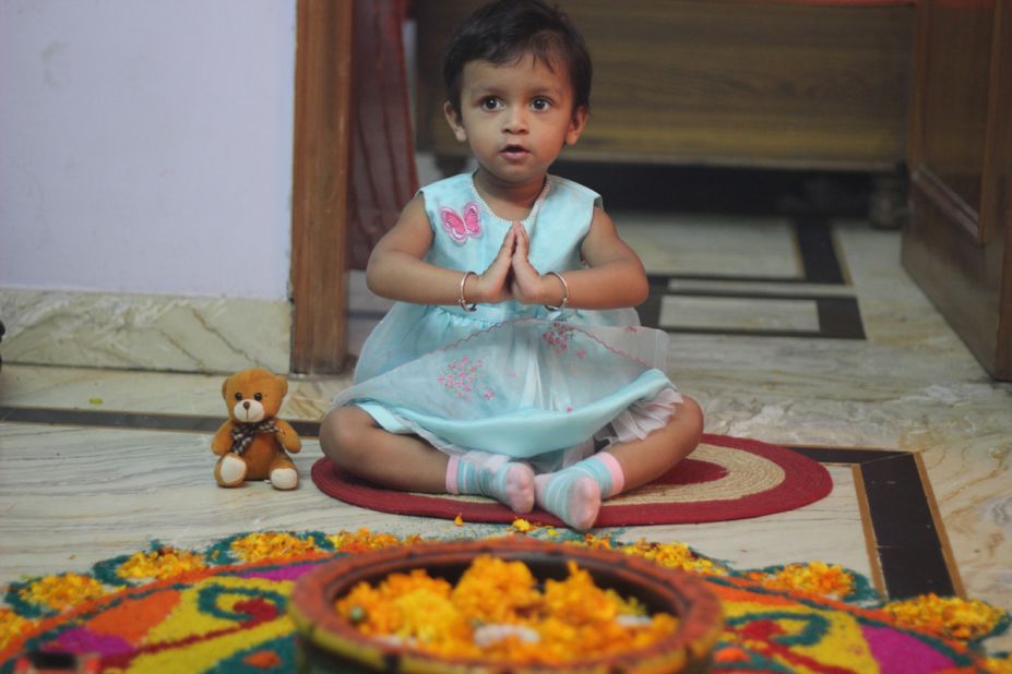 "This is my daughter Kyra doing Goddess Luxmi worship," says avid iReporter <a href="http://ireport.cnn.com/docs/DOC-881017" target="_blank">Manish Kanojia</a> from New Delhi. According to her dad, Kyra thoroughly enjoyed her first ever festival of lights although "she was slightly scared of the Diwali crackers." 
