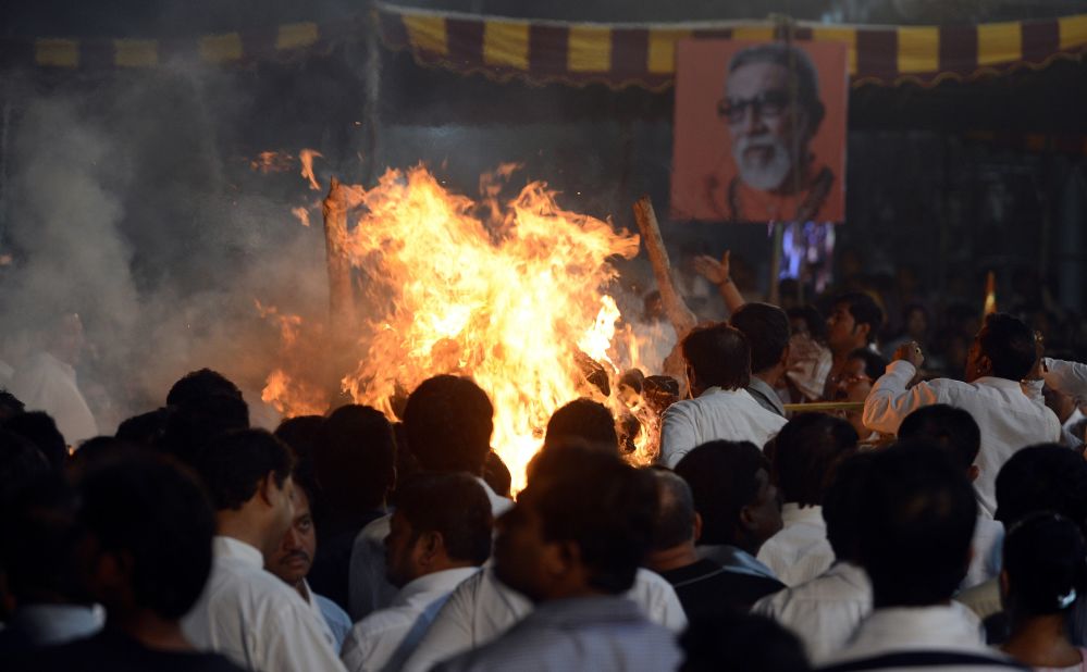 The funeral pyre of  Bal Thackeray goes up in flames in Mumbai.