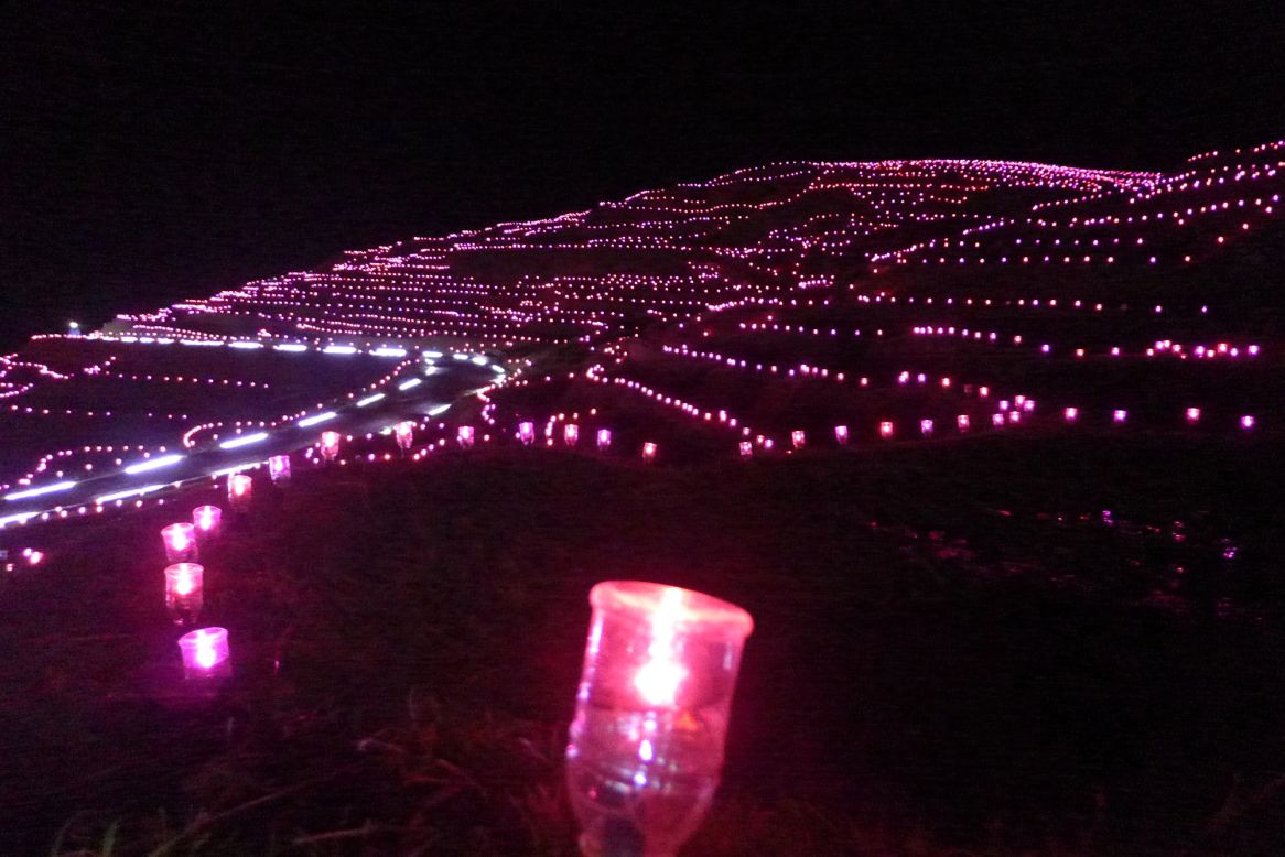 Solar lights illuminate plenty of suburban American yards. But in Wajima City, Japan, they light up a whole town. More than 220 volunteers planted 20,461 solar lights, which wound around terraced rice fields and set a world record.