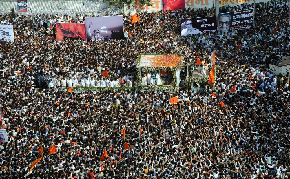 Thousands of Shiv Sena supporters from across the state take part in the funeral procession of Bal Thackeray in Mumbai, India, on Sunday.