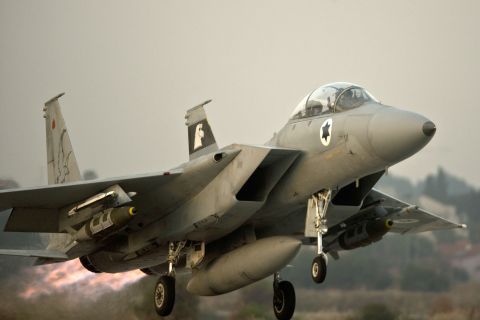 An Israeli F-15 takes off from an Israeli air force base on Monday, November 19, on a mission over the Gaza Strip. Israel carried out 80 strikes on Monday, raising to more than 1,300 the number of sites targeted since it began its bombing campaign on Wednesday, according to the Israel Defense Forces.