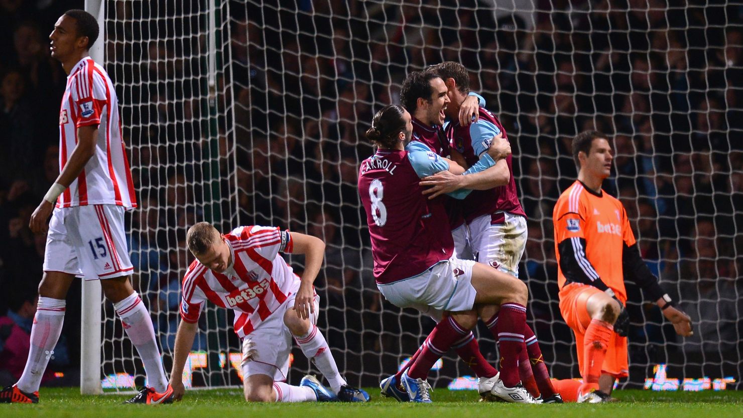 Joey O'Brien is sandwiched by Andy Carroll (8) and Kevin Nolan after scoring West Ham's equalizer against Stoke