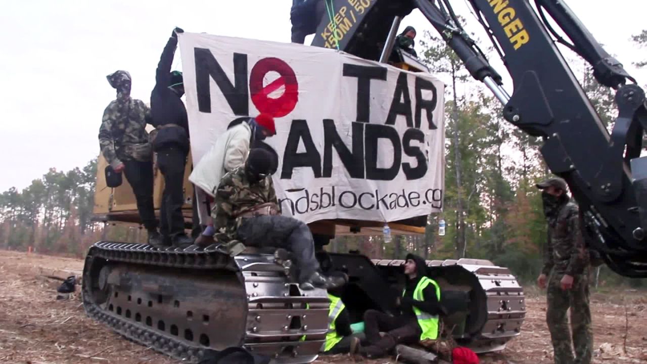Protesters block equipment Monday at a Keystone XL pipeline construction site in Cherokee County, Texas.