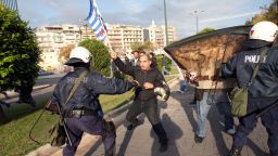Municipal workers clashes with riot police during a demonstration against the presence of a German deputy labour minister Hans-Joachim Fuchtel, in Thessaloniki on November 15, 2012. 