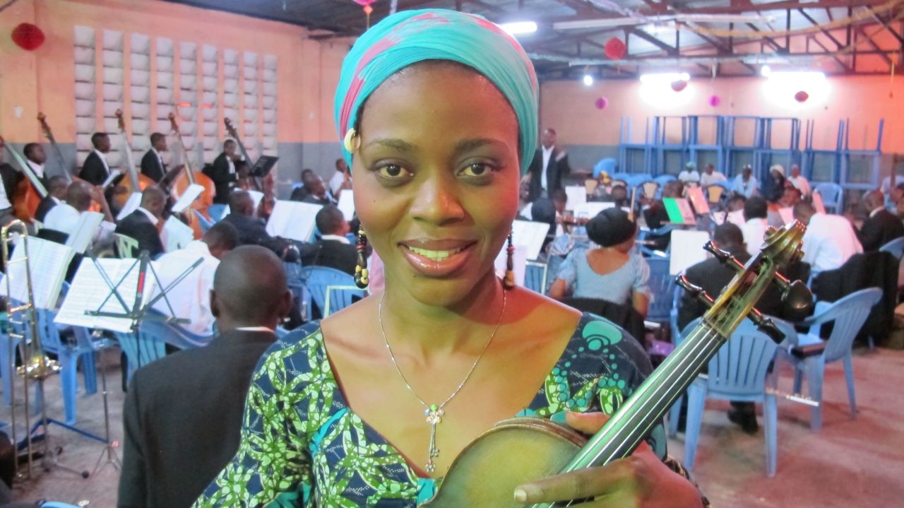 Violin player Pauleth Masamba has been playing with the Orchestre Symphonique Kimbanguiste since the mid-1990s. "Music is one of the things that comforts me, takes off the stress and makes me happy," she says.