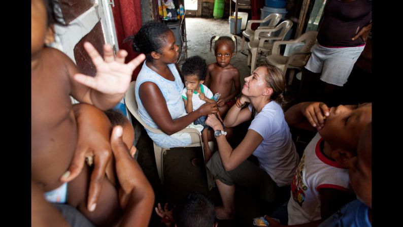 "(Escobar) took us to the poor communities where she does outreach to young mothers," photographer Krisanne Johnson said. "I immediately noticed her passion, her dedication and empathy toward the plight of these teen mothers, who struggle in very harsh conditions to makes ends meet and to keep their children healthy." 