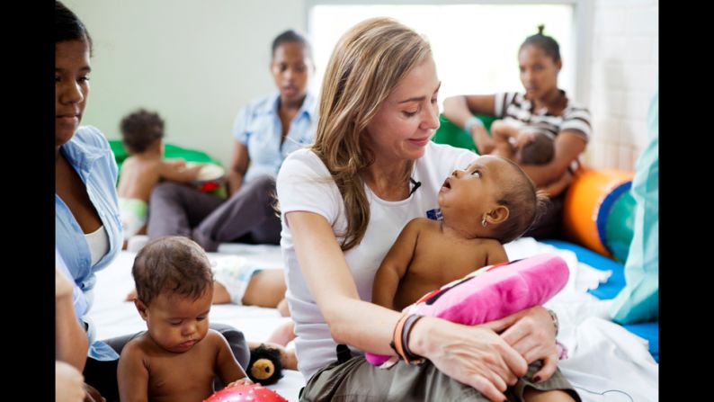 Escobar visits children at her foundation's day care facility. The day care is just part of the foundation's new center in Cartagena, which also houses a medical center, a cafeteria and classrooms for the teen mothers program.