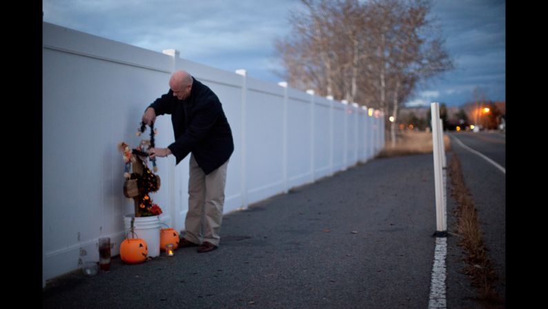 McCarthy adjusts holiday decorations at the memorial where his daughter Mariah was killed in Butte, Montana. Mariah and two of her friends were walking down a sidewalk in 2007 when a 20-year-old drunken driver hit them. Mariah, 14, was killed. Her two friends survived.