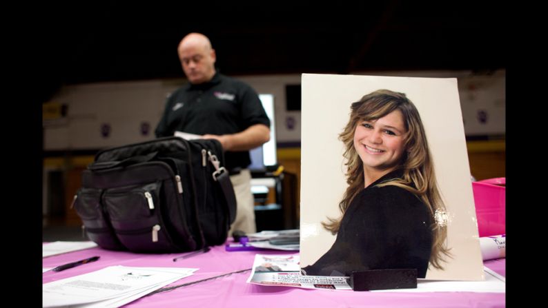A portrait of Mariah sits on a table as McCarthy prepares to talk to a group of junior high and high school students in Boulder, Montana.