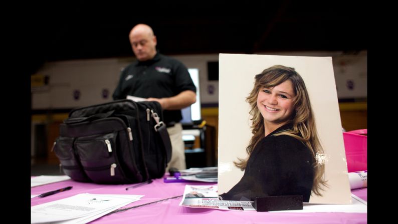 A portrait of Mariah sits on a table as McCarthy prepares to talk to a group of junior high and high school students in Boulder, Montana.