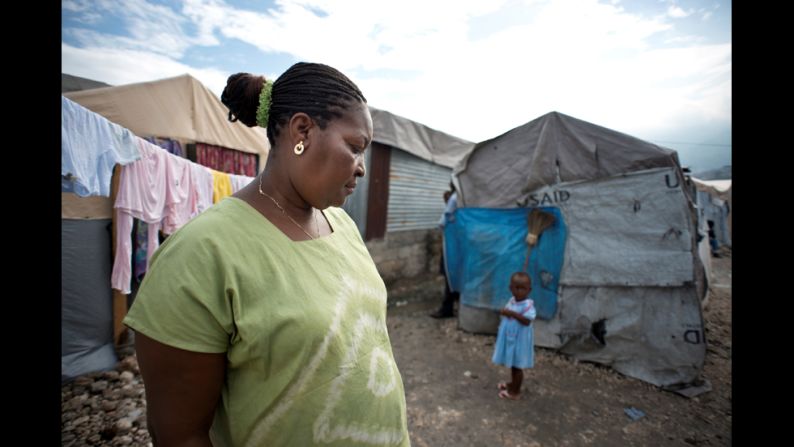 Villard-Appolon walks through the tent camp where she used to live in Port-au-Prince. After the earthquake, camps were set up to provide shelter for more than a million displaced Haitians. But because of a lack of security in these tent cities, many women have been victims of assault, Villard-Appolon said.