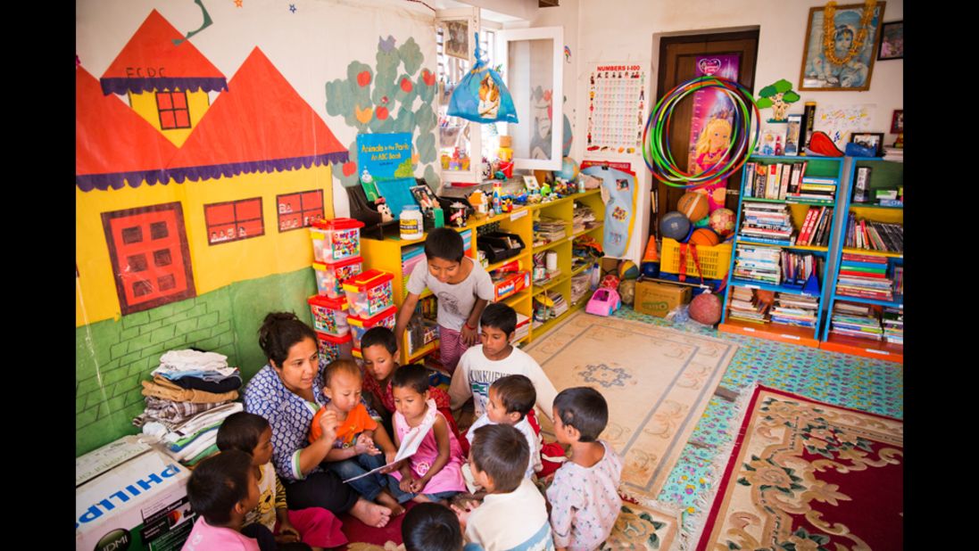 Basnet reads to some of the children at the Butterfly Home in Kathmandu. "I don't ever get a day off, but if I [didn't] have the children around me, it would be hard," she said. "When I'm with them, I'm happy."