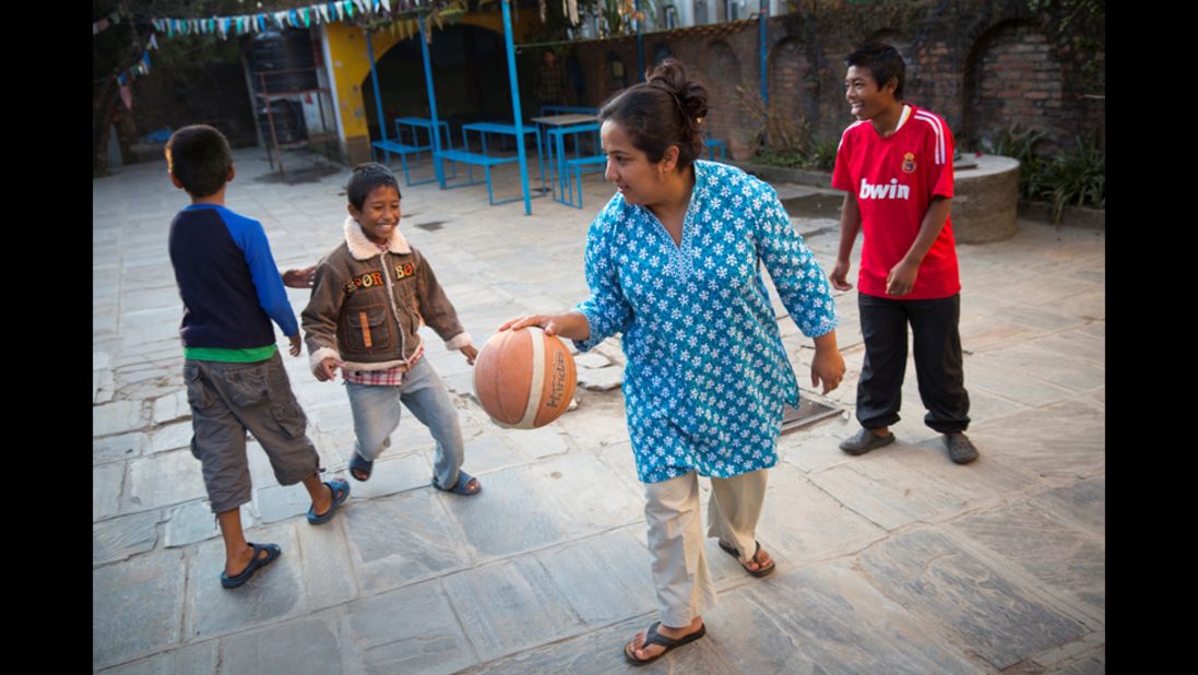 "The first thing you notice about Pushpa is her huge smile to welcome you," photographer Mohan said. "She's full of energy. She has this incredibly booming voice that never stops all day, all night."