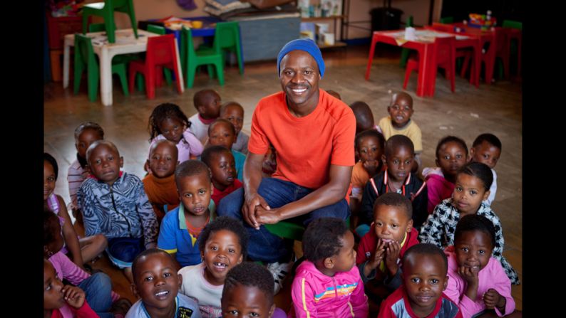 "It was amazing to see Thulani interacting with the children and the respect they have for him," photographer Torgovnik said. "They know that with his help, they can fulfill their dreams. He's very demanding of them, and they respect that."