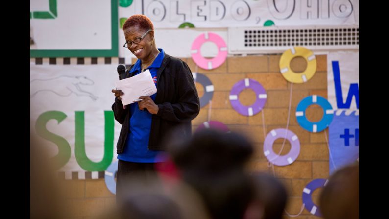 Butts talks about water safety during an assembly at the Gesu School in Toledo, Ohio. One of her goals is to raise awareness about drowning prevention, especially in communities where statistics indicate drownings are more likely to happen.