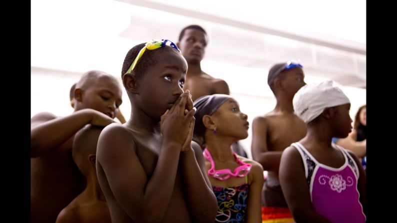 Children prepare for swimming lessons at St. Francis de Sales High School in Toledo.