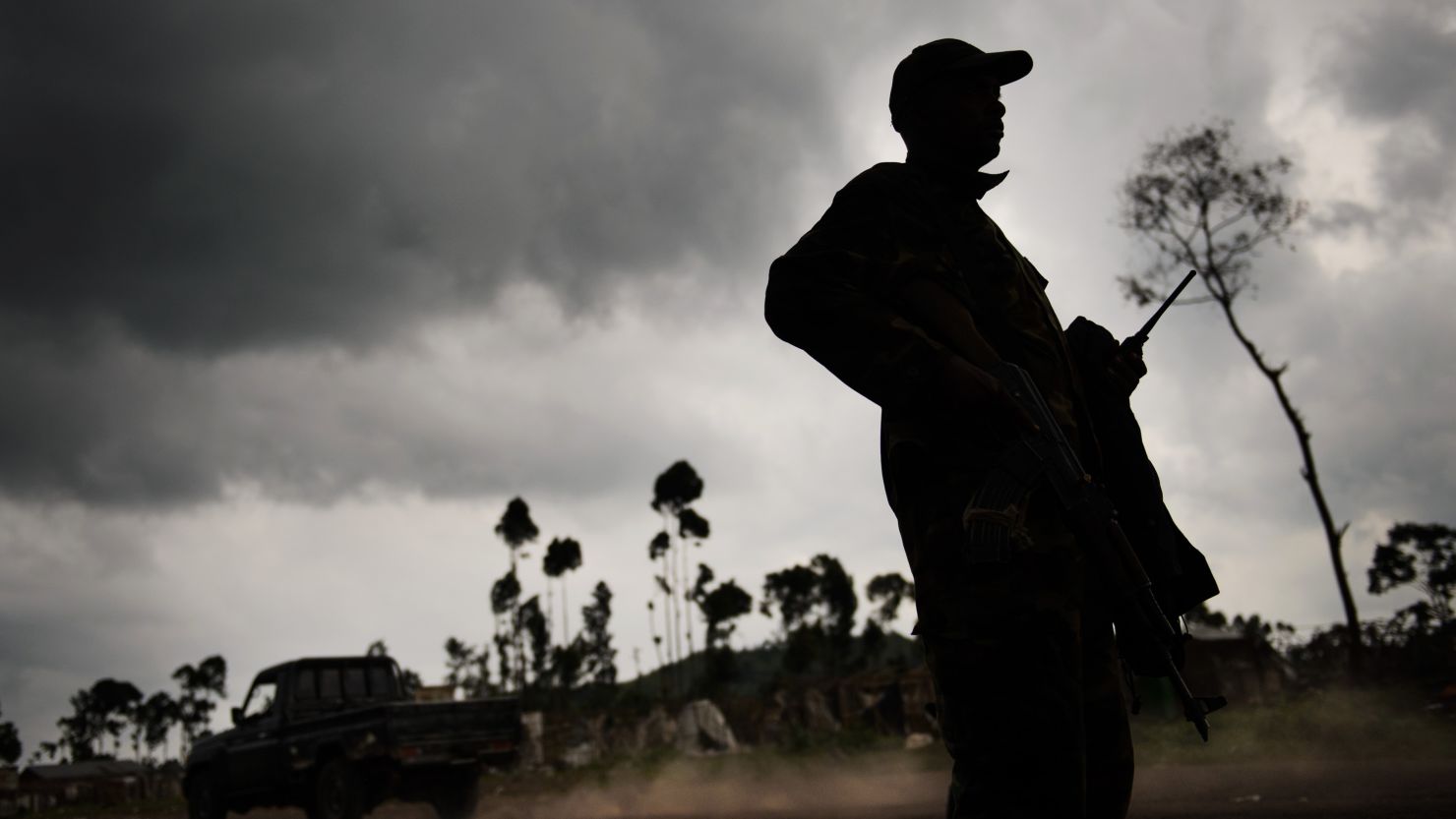 An M23 rebel stands guard in the village of Kanyarucinya, in eastern Democratic Republic of the Congo, on November 18, 2012.