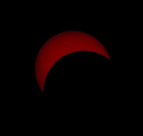 "The photograph I uploaded is approximately 17-18 minutes past the peak of the eclipse. The reason I chose that photo is because it shows a few Sun spots, and it's not just a solid block of reddish colour like those I took closer to the peak," says <a href="http://ireport.cnn.com/docs/DOC-882137" target="_blank">Goran Ristic</a> from Auckland, New Zealand. 