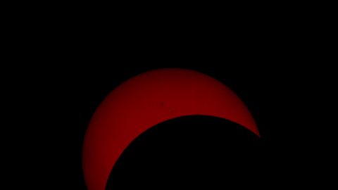 "The photograph I uploaded is approximately 17-18 minutes past the peak of the eclipse. The reason I chose that photo is because it shows a few Sun spots, and it's not just a solid block of reddish colour like those I took closer to the peak," says <a href="http://ireport.cnn.com/docs/DOC-882137" target="_blank">Goran Ristic</a> from Auckland, New Zealand.