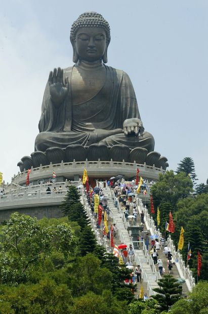 Worshippers gather at the giant Buddha at Po Lin Monastery on Lantau Island near Hong Kong. 
