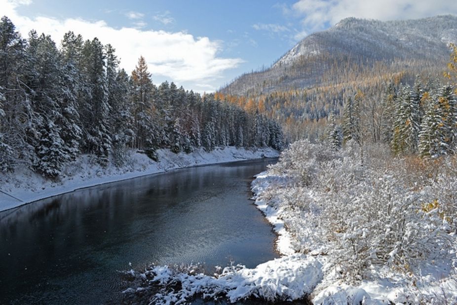 Glacier National Park in Montana offers more than 700 miles of hiking trails. This snowy view of Apgar Mountain is from Lower McDonald Creek. 