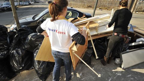 AmeriCares volunteers help clean out flood-damaged homes in Queens, New York, during "Operation Muck-Out."