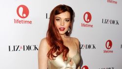 Actress Lindsay Lohan arrives at a party to celebrate Lifetime's 'Liz & Dick' at the Beverly Hills Hotel on November 20, 2012 in Beverly Hills, California.