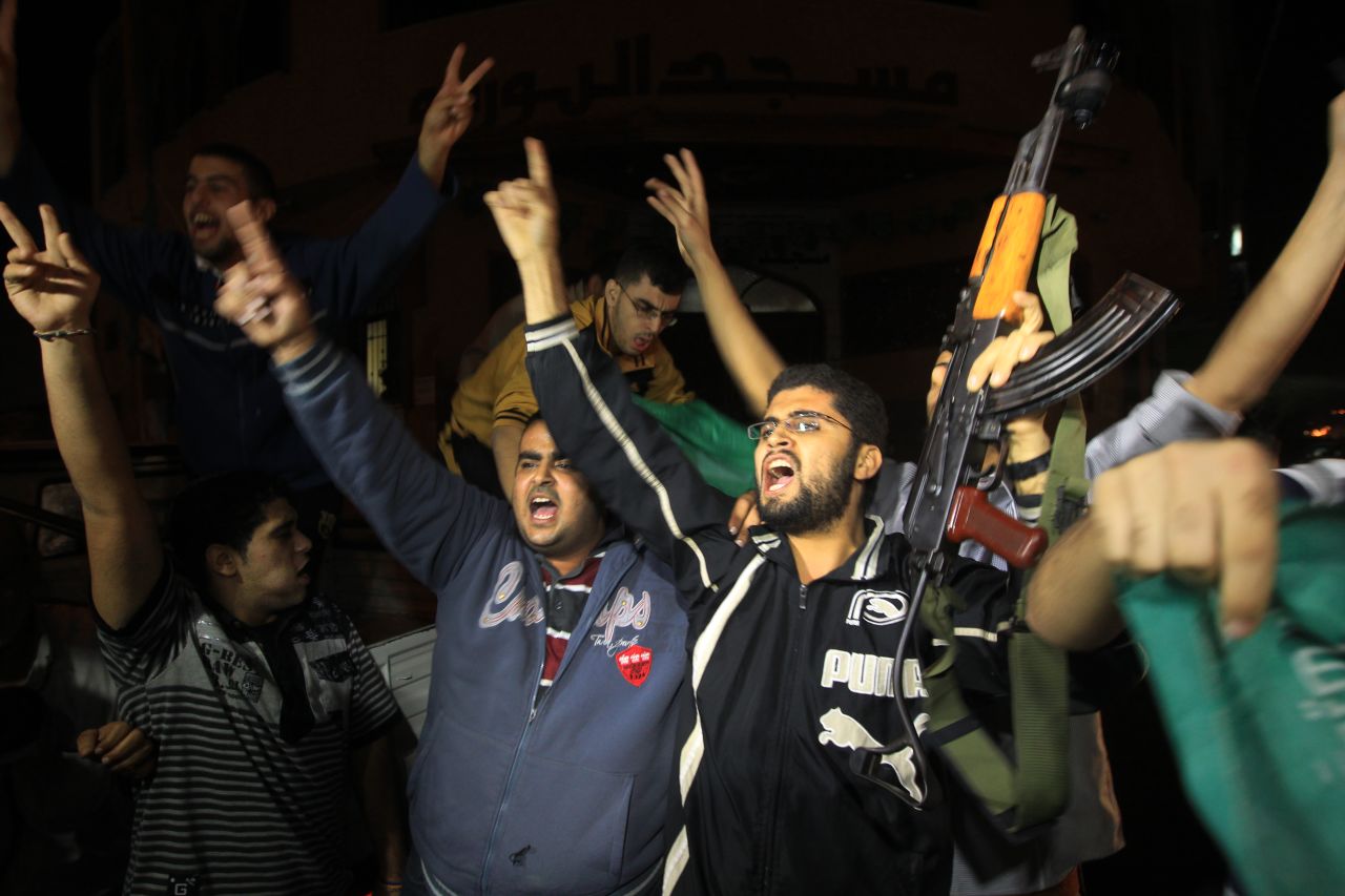 Palestinians celebrate news of the cease-fire with Israel in Gaza City on Wednesday, November 21. 