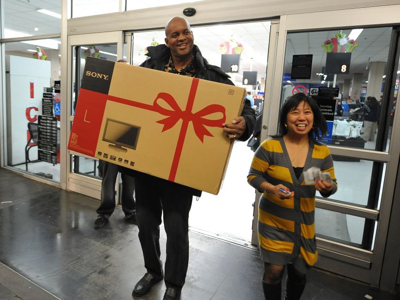 Bobby (left) and Daisy Whitley scored a large, high definition TV on their 2009 Black Friday trip to a Los Angeles, California Wal-Mart.