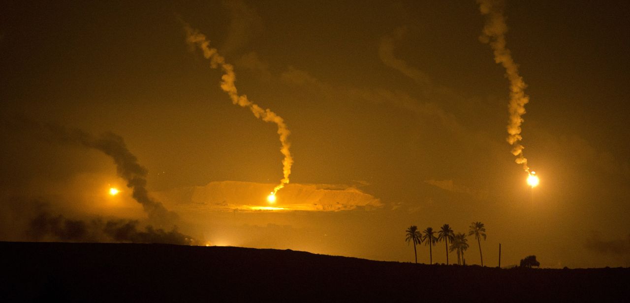 Israeli-fired artillery flares illuminate the sky over the southern Israeli border with Gaza Tuesday as fighting continues.