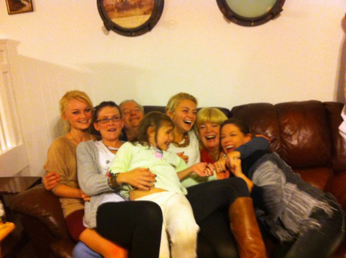 Family and friends pile on the couch at the so-called 'Douglas Family Compound.'