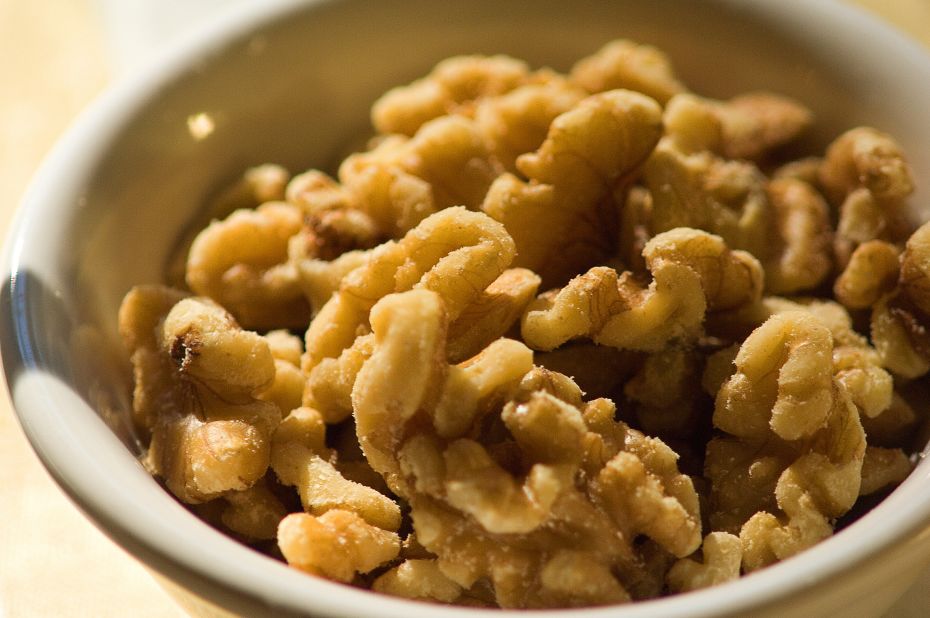 Walnuts are packed with tryptophan, an amino acid your body needs to create the feel-great chemical serotonin. (In fact, Spanish researchers found that walnut eaters have higher levels of this natural mood-regulator.) Another perk: "They're digested slowly," says Dr. David Katz, director of the Yale Prevention Research Center. "This contributes to mood stability and can help you tolerate stress."