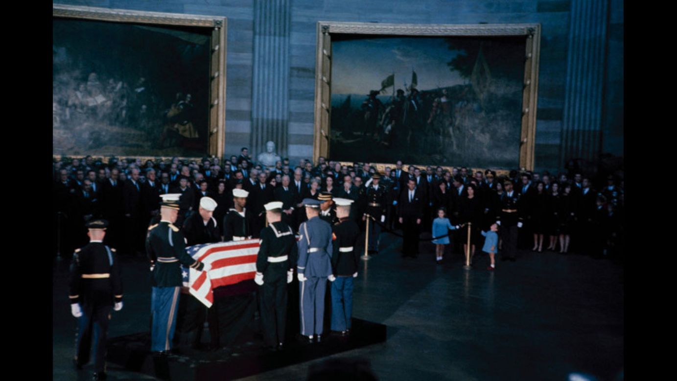 Kennedy's flag-draped casket lies in state in Washington.